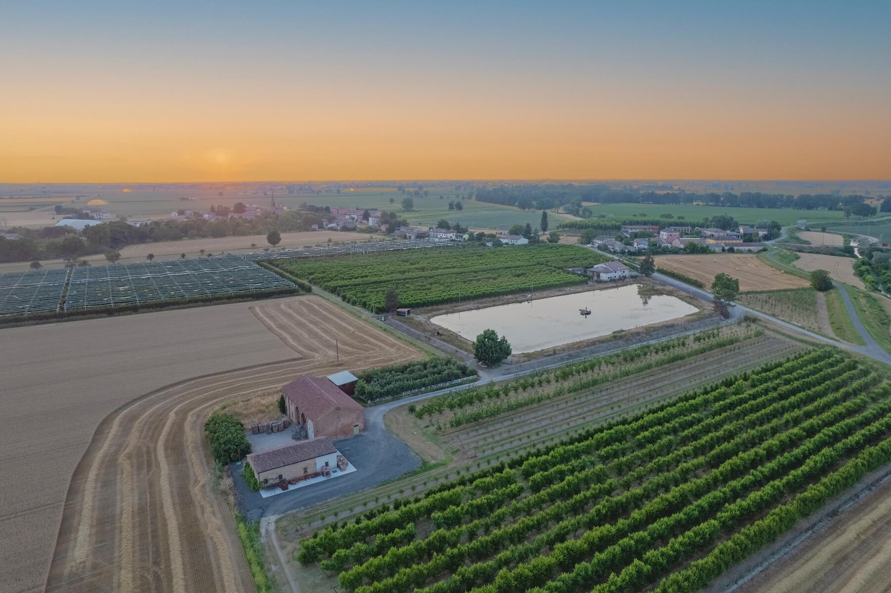 An aerial view of a winery that also manages a farm. With multi-location winery operations management, the winery and farm can continue to grow.
